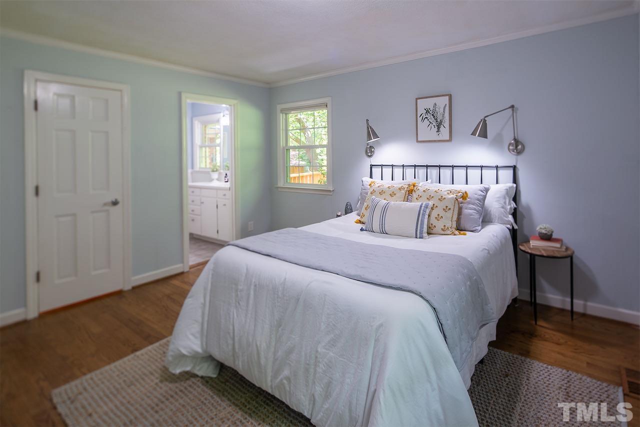 6420 Brandywine Road Raleigh, NC 27607 - Photo 16 of 28 a bedroom with a bed and window