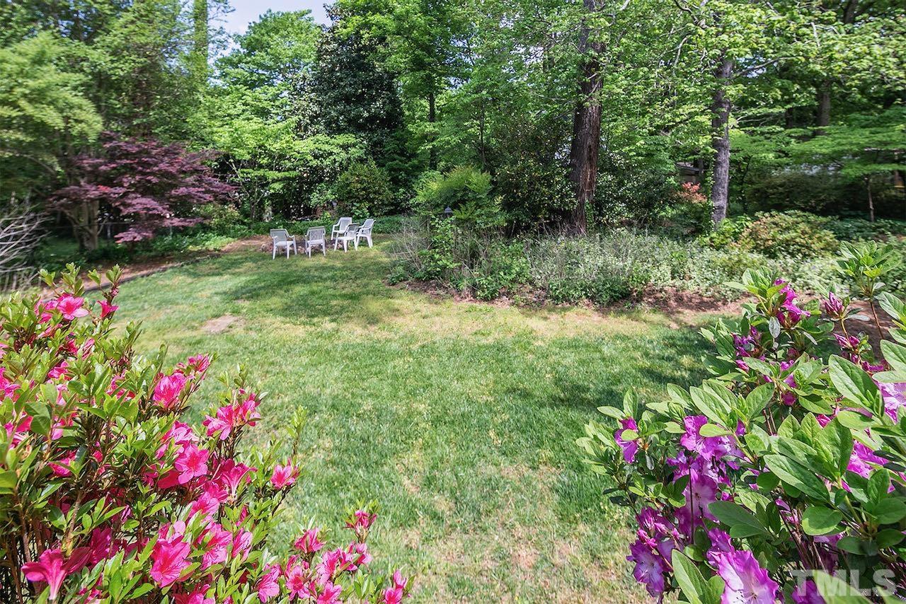 6420 Brandywine Road Raleigh, NC 27607 - Photo 2 of 28 a view of a flower in a garden of a house
