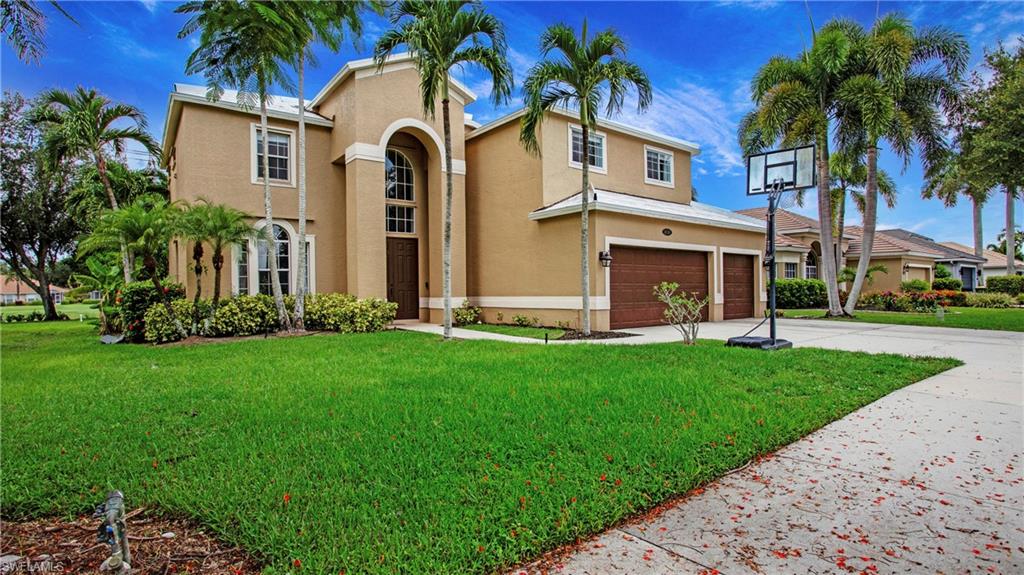 14590 Indigo Lakes Circle Naples, FL 34119 - Photo 2 of 45 Welcome to 14590 Indigo Lakes Circle