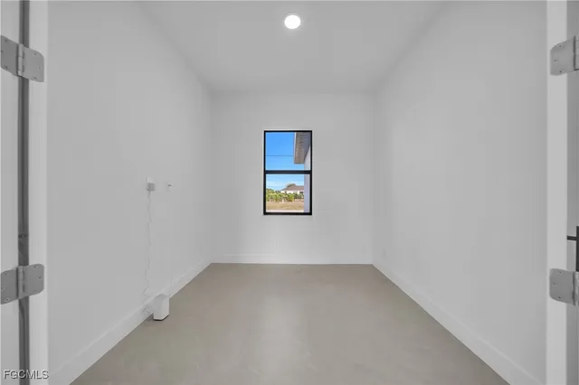an empty room with a window