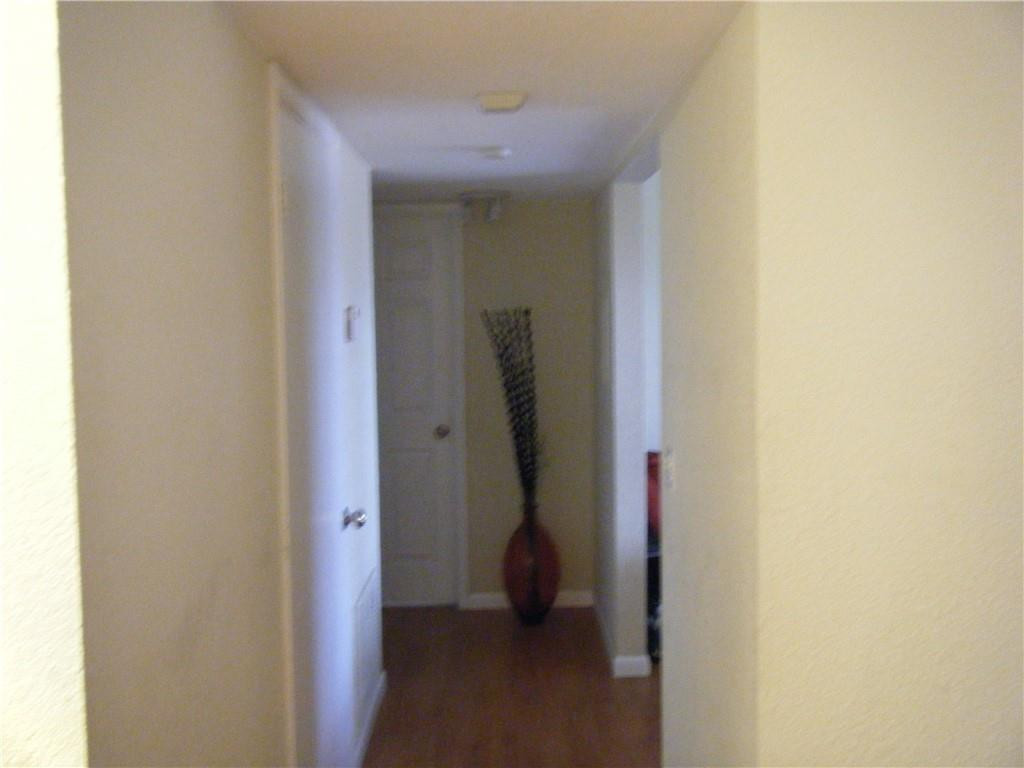 4421 West McNab Road, Unit 19 Pompano Beach, FL 33069 - Photo 11 of 20 a view of a hallway with entryway