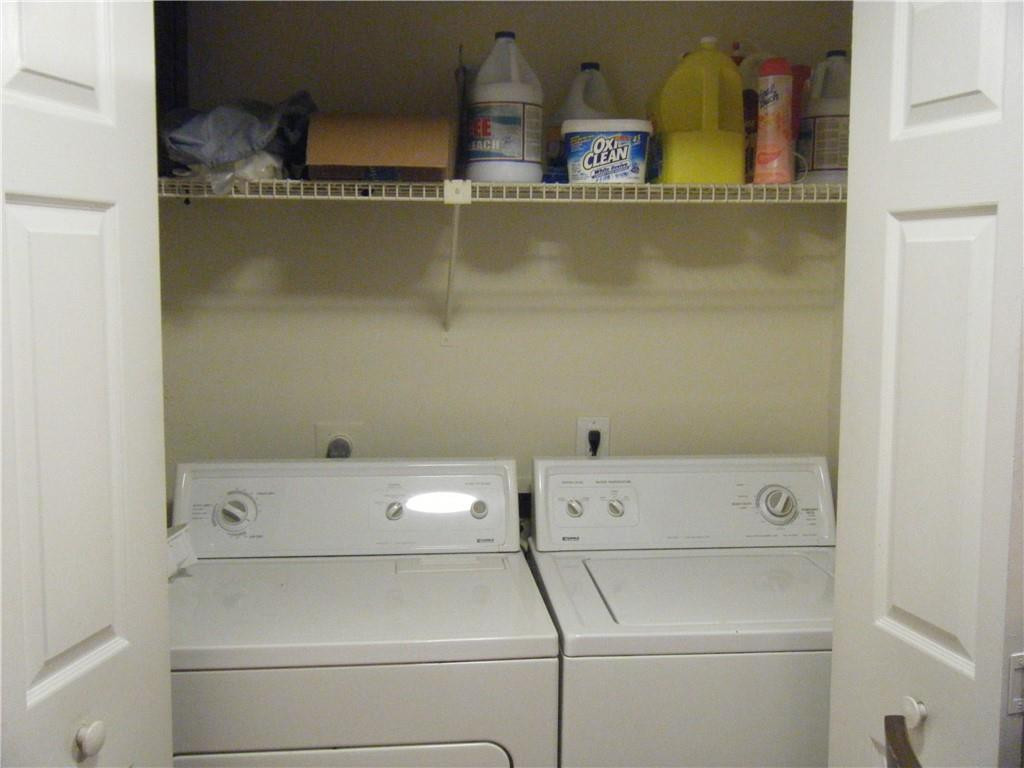 4421 West McNab Road, Unit 19 Pompano Beach, FL 33069 - Photo 14 of 20 a close view of washer and dryer