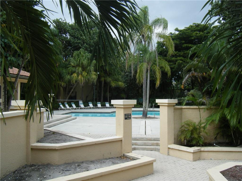 4421 West McNab Road, Unit 19 Pompano Beach, FL 33069 - Photo 16 of 20 a outdoor view with a sitting space