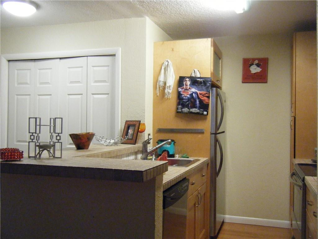 4421 West McNab Road, Unit 19 Pompano Beach, FL 33069 - Photo 7 of 20 a bathroom with a sink and a mirror