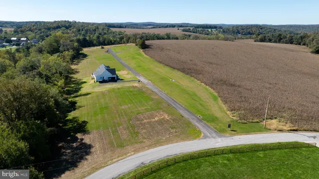 a view of a lake with a yard