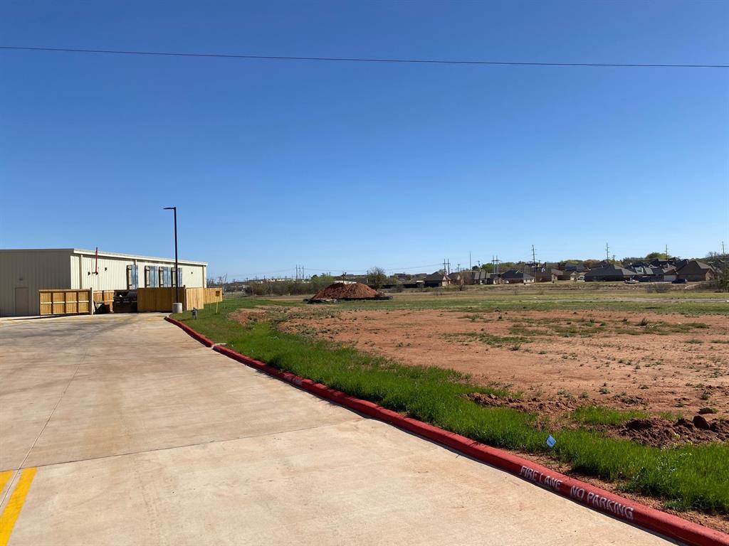 6809 Buffalo Gap Road Abilene, TX 79606 - Photo 7 of 11 a view of a lake with a big yard