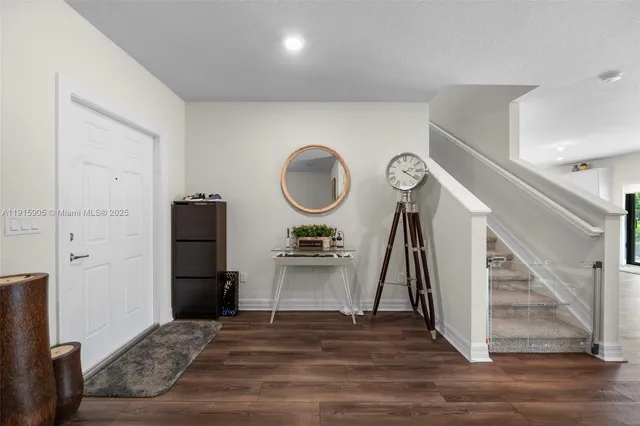 a view of a livingroom with wooden floor