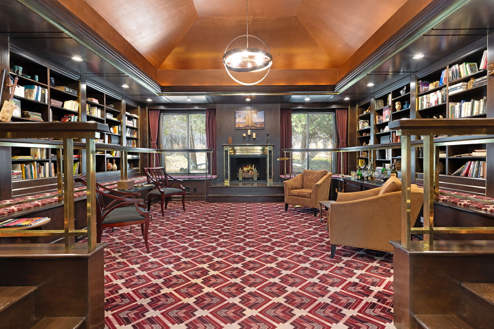 2705 Bentley Road Highland Park, IL 60035 - Photo 22 of 49 a living room with furniture a fireplace and a chandelier