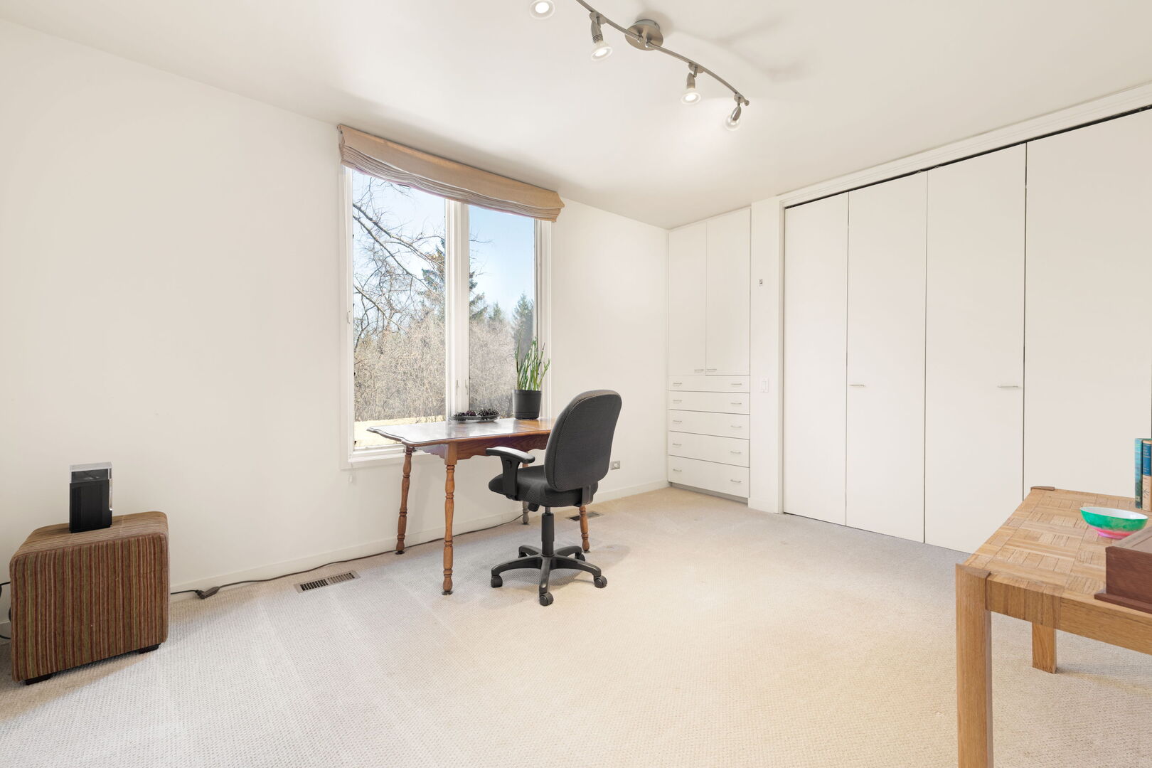 2705 Bentley Road Highland Park, IL 60035 - Photo 35 of 49 a view of a workspace with furniture and a window