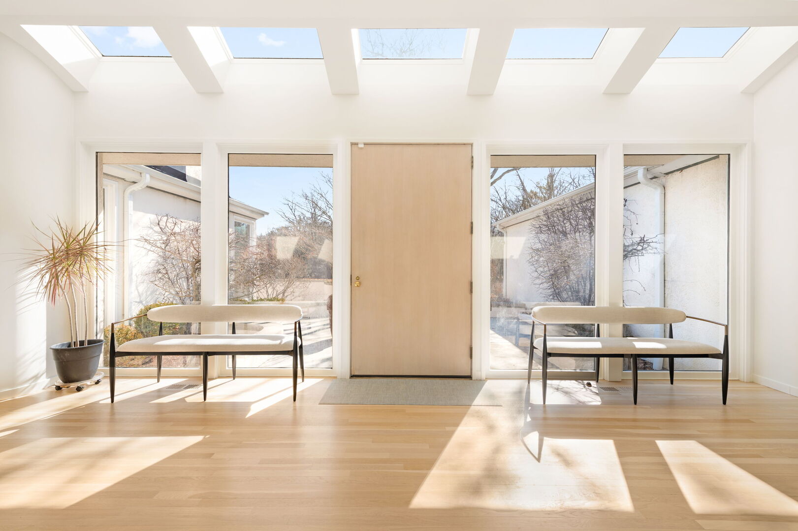 2705 Bentley Road Highland Park, IL 60035 - Photo 4 of 49 a living room with furniture a wooden floor and a table