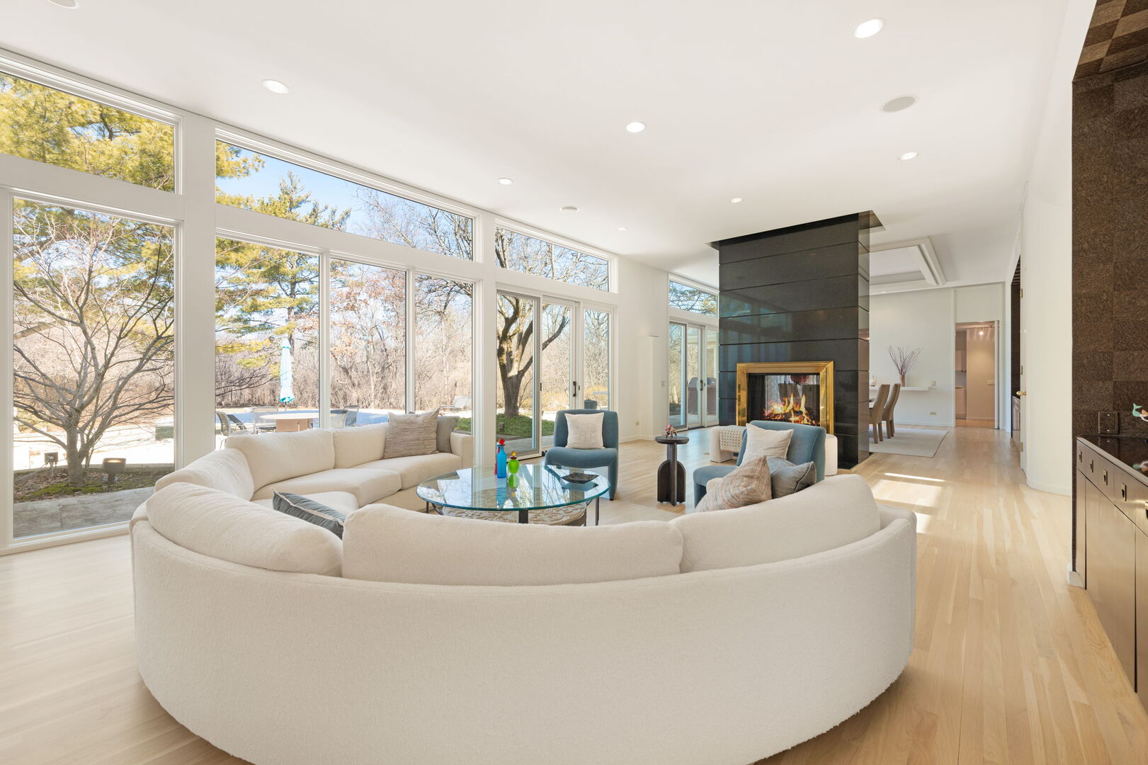 2705 Bentley Road Highland Park, IL 60035 - Photo 6 of 49 a living room with fireplace furniture and a large window