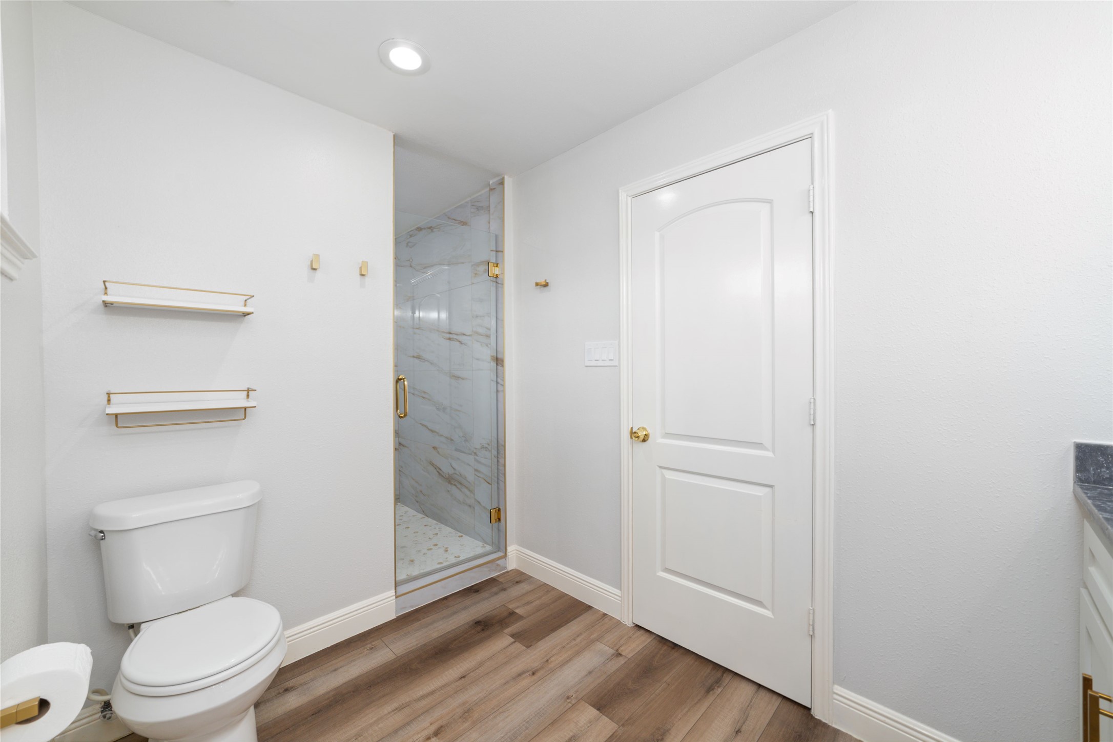 5922 Hummingbird Street Houston, TX 77096 - Photo 18 of 26 Beyond the beautiful finishes, you'll appreciate the updates behind the walls, including copper water supply lines, an updated 200-amp electrical panel with generator-ready service, and a new water heater installed in 2025.
