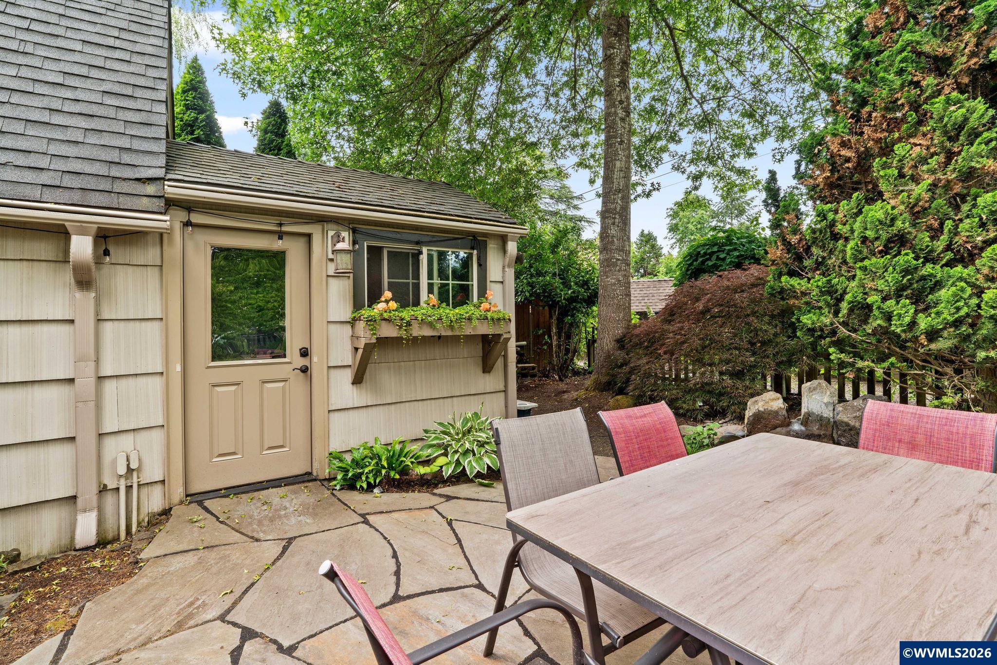 444 Northwest 35th Street Corvallis, OR 97330 - Photo 39 of 40 a view of backyard with seating space and wooden fence