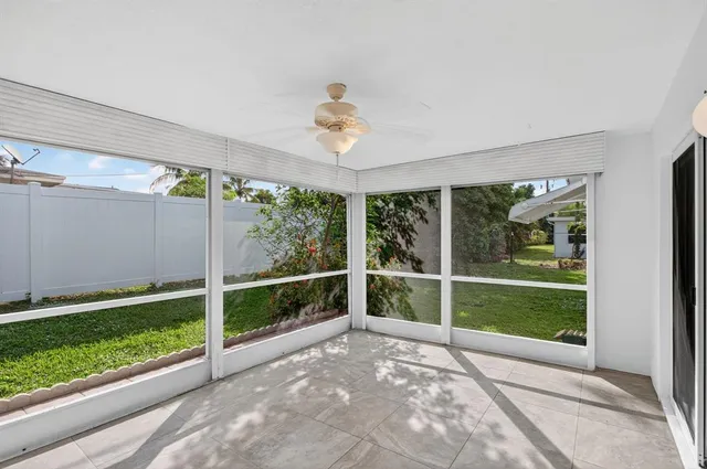 a view of a room with a large window