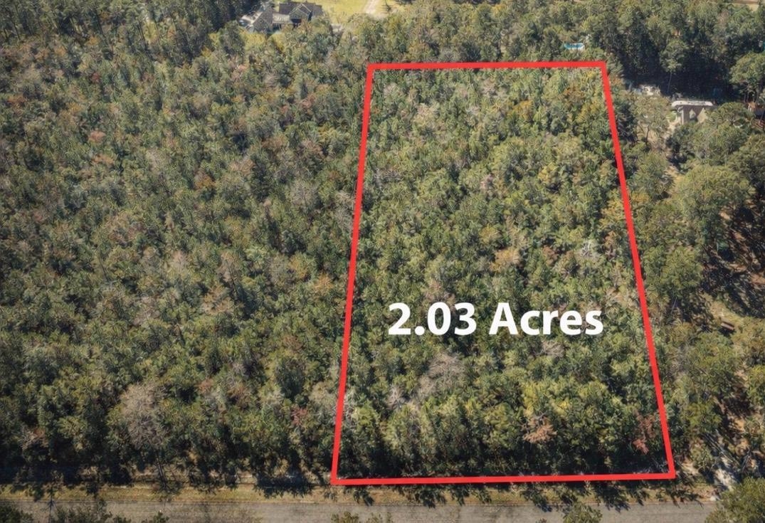 Aerial view of property's location featuring property parcel outlined