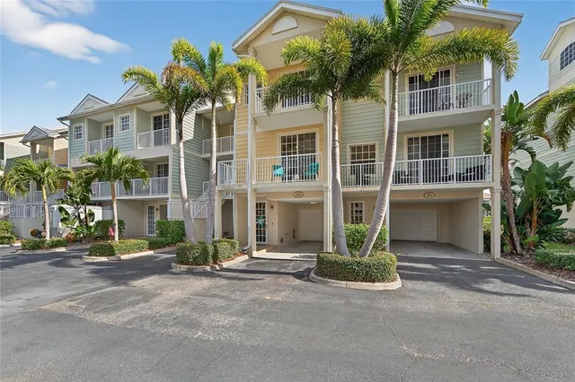a view of a chair and table in the balcony