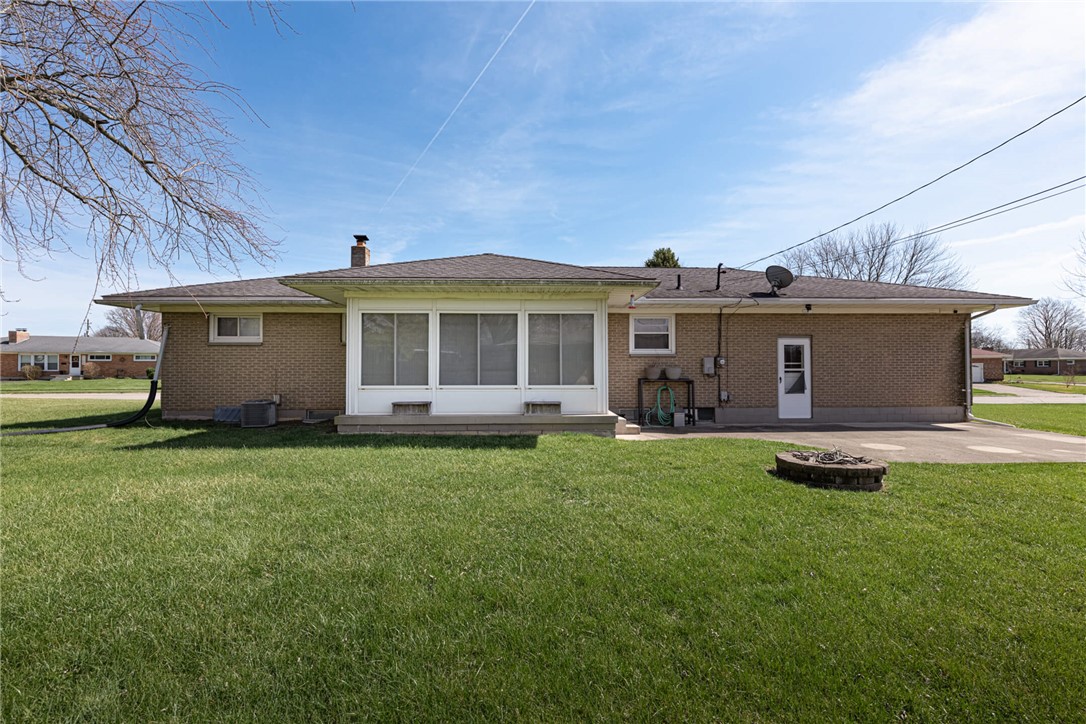 5235 West Ridgewood Road Springfield, OH 45503 - Photo 31 of 32 This ranch-style home features a spacious yard and an inviting sunroom, perfect for relaxation.