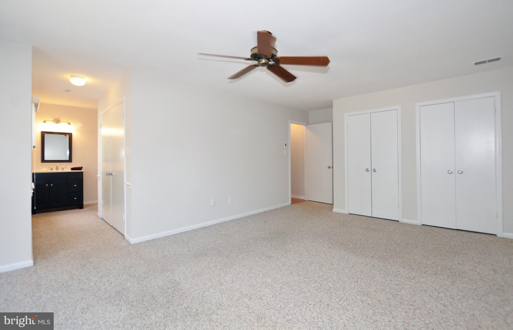 10413 Mountain Quail Road Silver Spring, MD 20901 - Photo 12 of 17 Spacious master bedroom suite with dressing area.