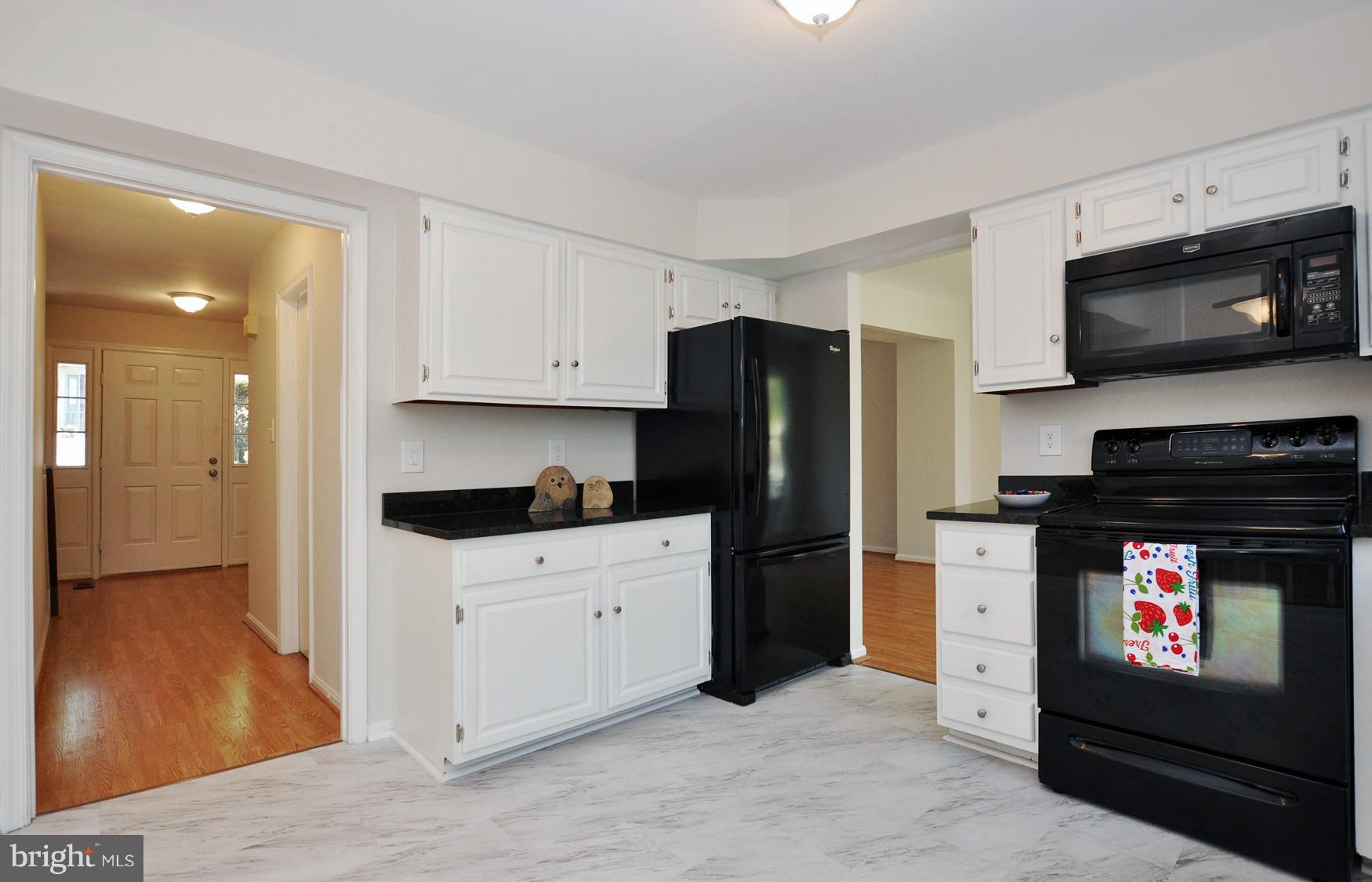10413 Mountain Quail Road Silver Spring, MD 20901 - Photo 5 of 17 Renovated table space kitchen with Black Granite.