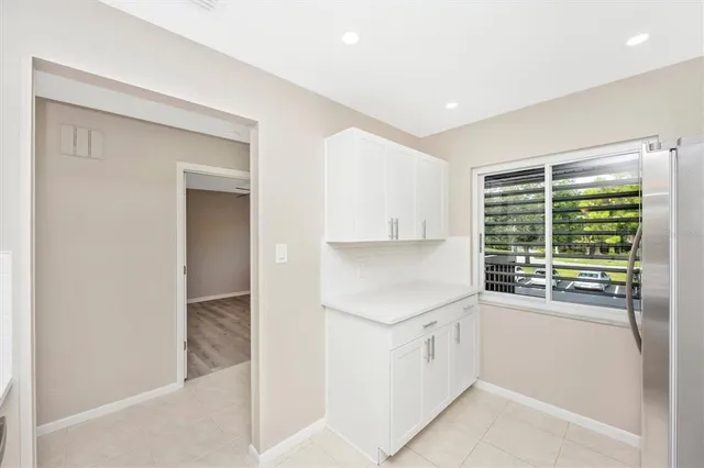 a view of a kitchen with a sink