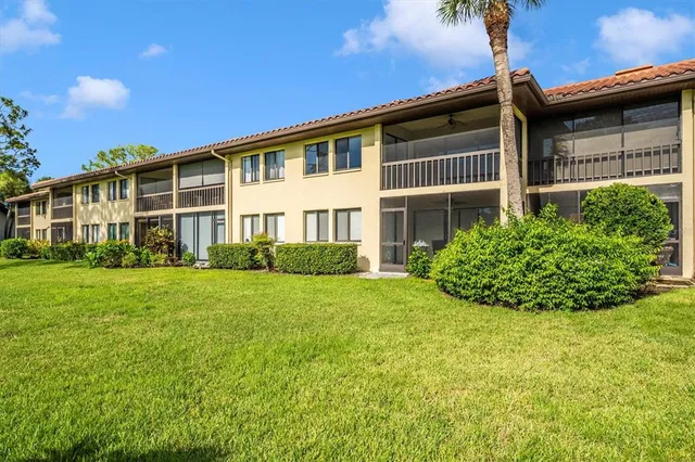 a view of swimming pool with a lounge chair