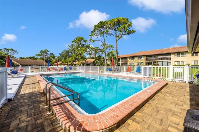 a view of city from terrace with seating space