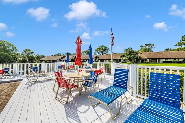 swimming pool view with a backyard space