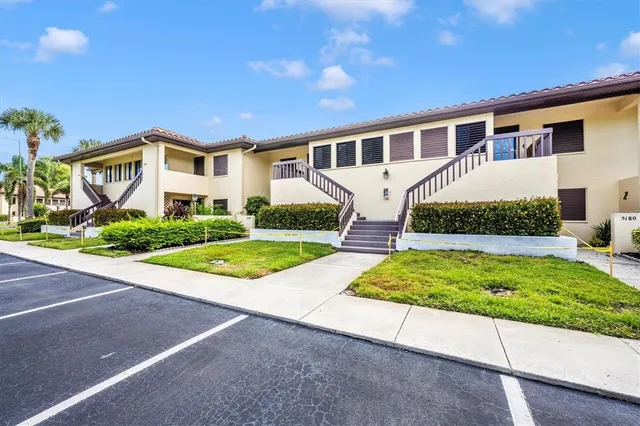 a view of house with outdoor space and porch