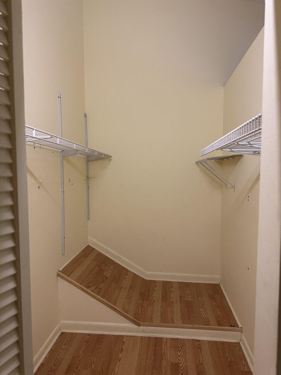 65 Maplecrest Circle Jupiter, FL 33458 - Photo 15 of 31 a view of small space with racks on the wall