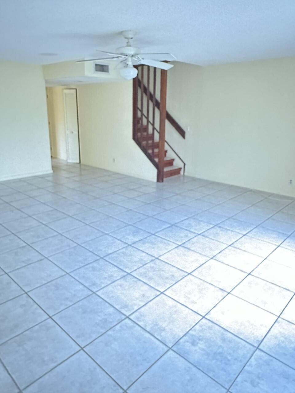 65 Maplecrest Circle Jupiter, FL 33458 - Photo 20 of 31 a view of entryway and hall