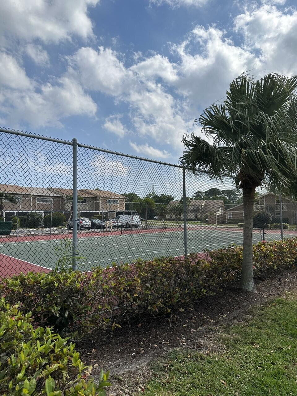 65 Maplecrest Circle Jupiter, FL 33458 - Photo 22 of 31 a view of a backyard
