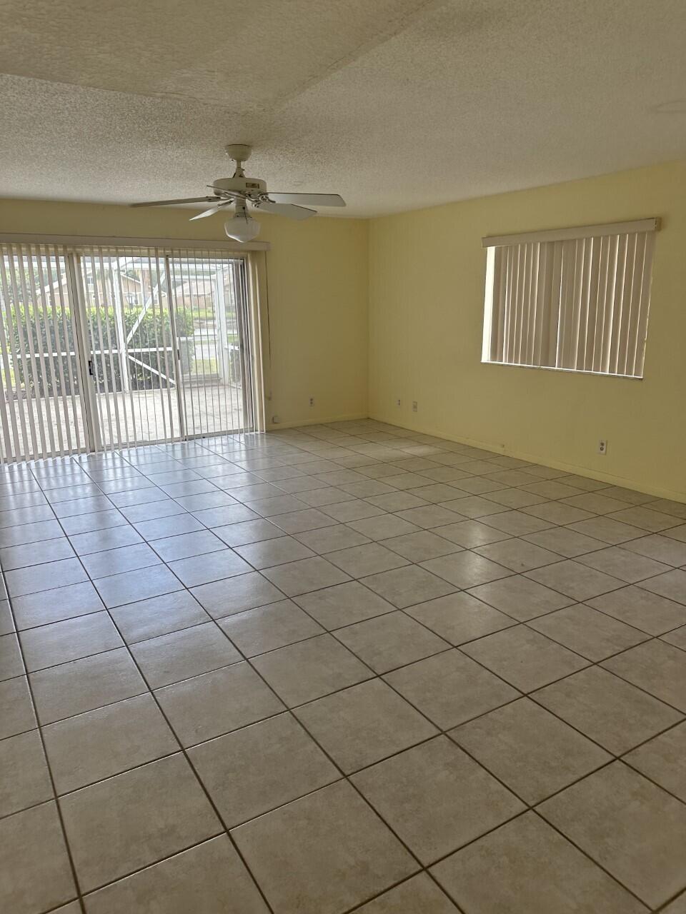 65 Maplecrest Circle Jupiter, FL 33458 - Photo 9 of 31 a view of an empty room and a window
