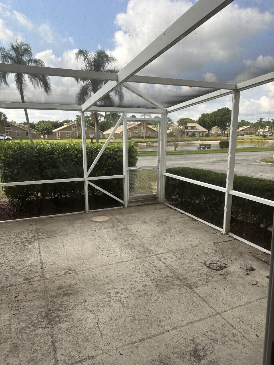 65 Maplecrest Circle Jupiter, FL 33458 - Photo 10 of 31 a view of outdoor space with wooden floor