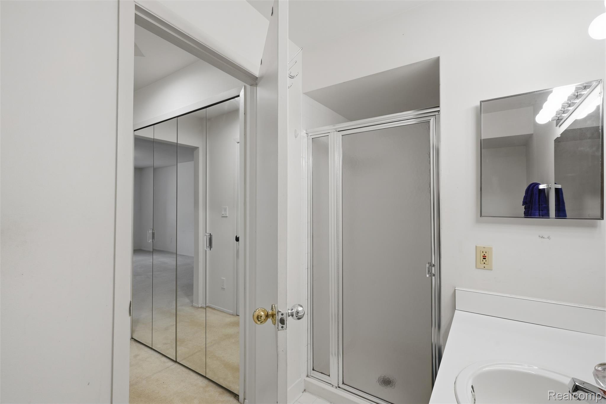 29726 Pine Ridge Circle Farmington, MI 48331 - Photo 15 of 40 Bathroom featuring a white countertop with integrated sink,
