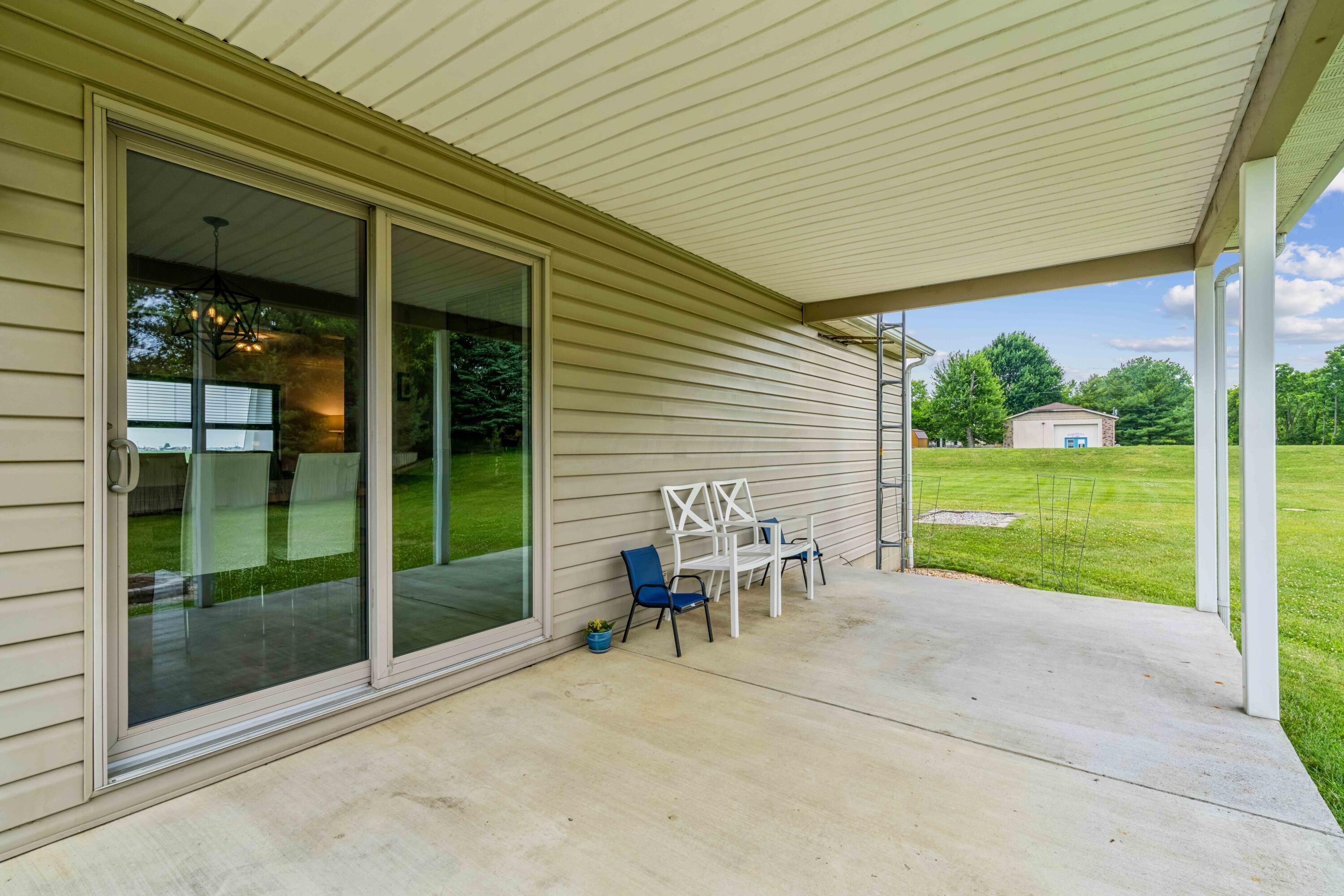 8884 Weiser Road Waldo, OH 43356 - Photo 26 of 37 Covered back porch, perfect for entertaining and relaxing!