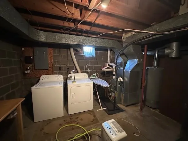 a utility room with dryer and washer