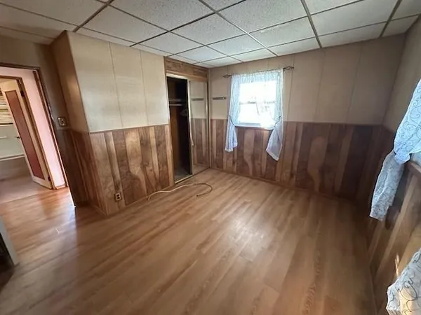 a view of entryway with wooden floor
