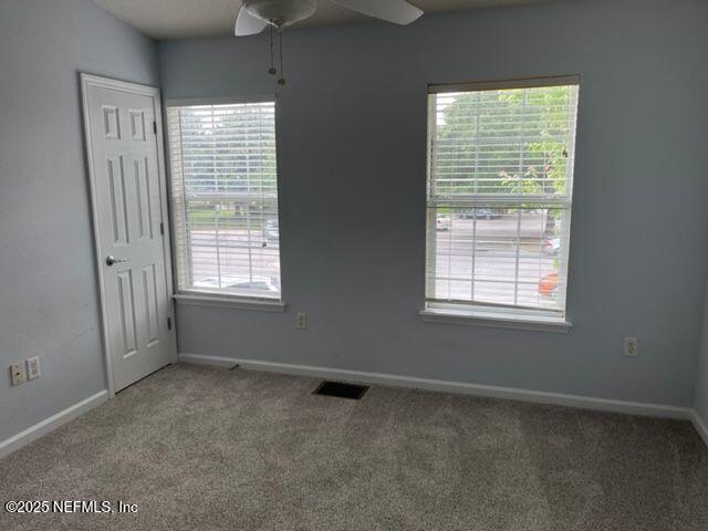 6747 Arching Branch Circle Jacksonville, FL 32258 - Photo 12 of 25 an empty room with windows