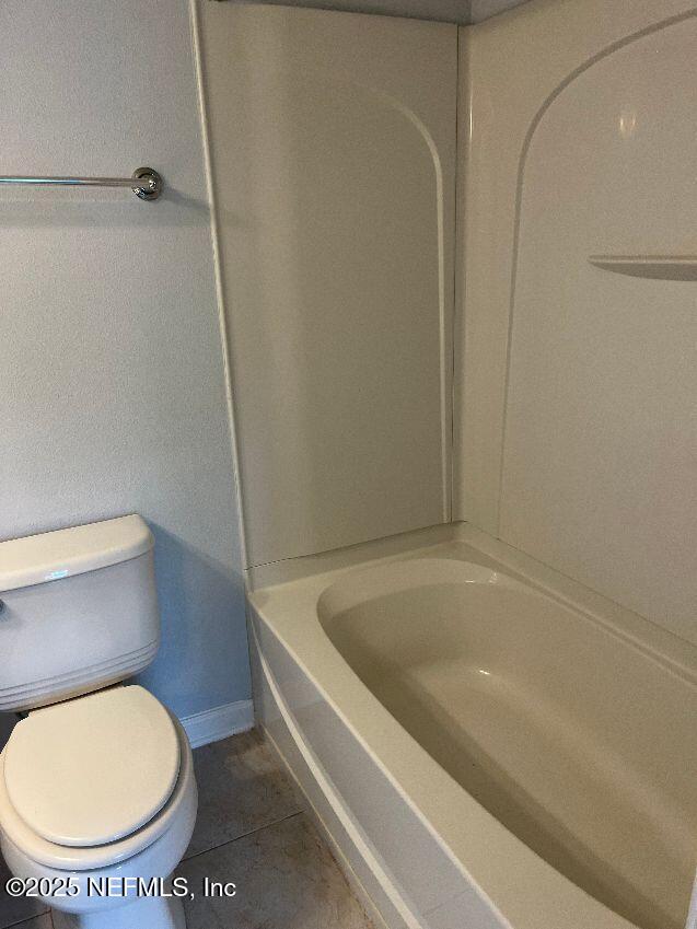 6747 Arching Branch Circle Jacksonville, FL 32258 - Photo 15 of 25 a bathroom with a toilet and a bathtub