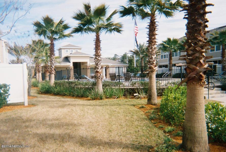 6747 Arching Branch Circle Jacksonville, FL 32258 - Photo 20 of 25 a front view of a house with a garden