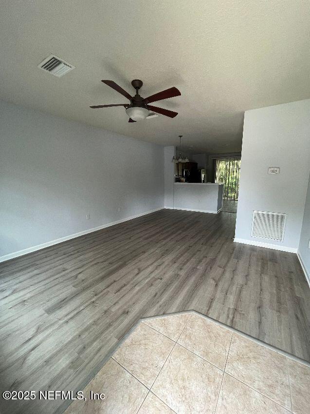 6747 Arching Branch Circle Jacksonville, FL 32258 - Photo 2 of 25 a view of a room with wooden floor