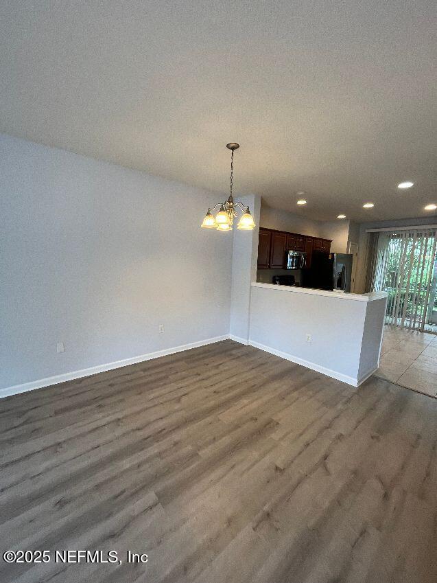 6747 Arching Branch Circle Jacksonville, FL 32258 - Photo 3 of 25 a view of a kitchen with a dishwasher and cabinets
