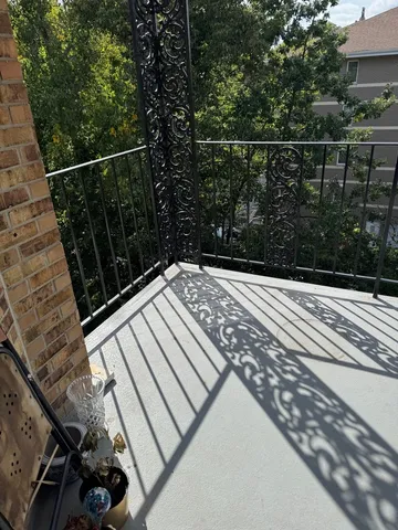 a view of a roof with wooden floor