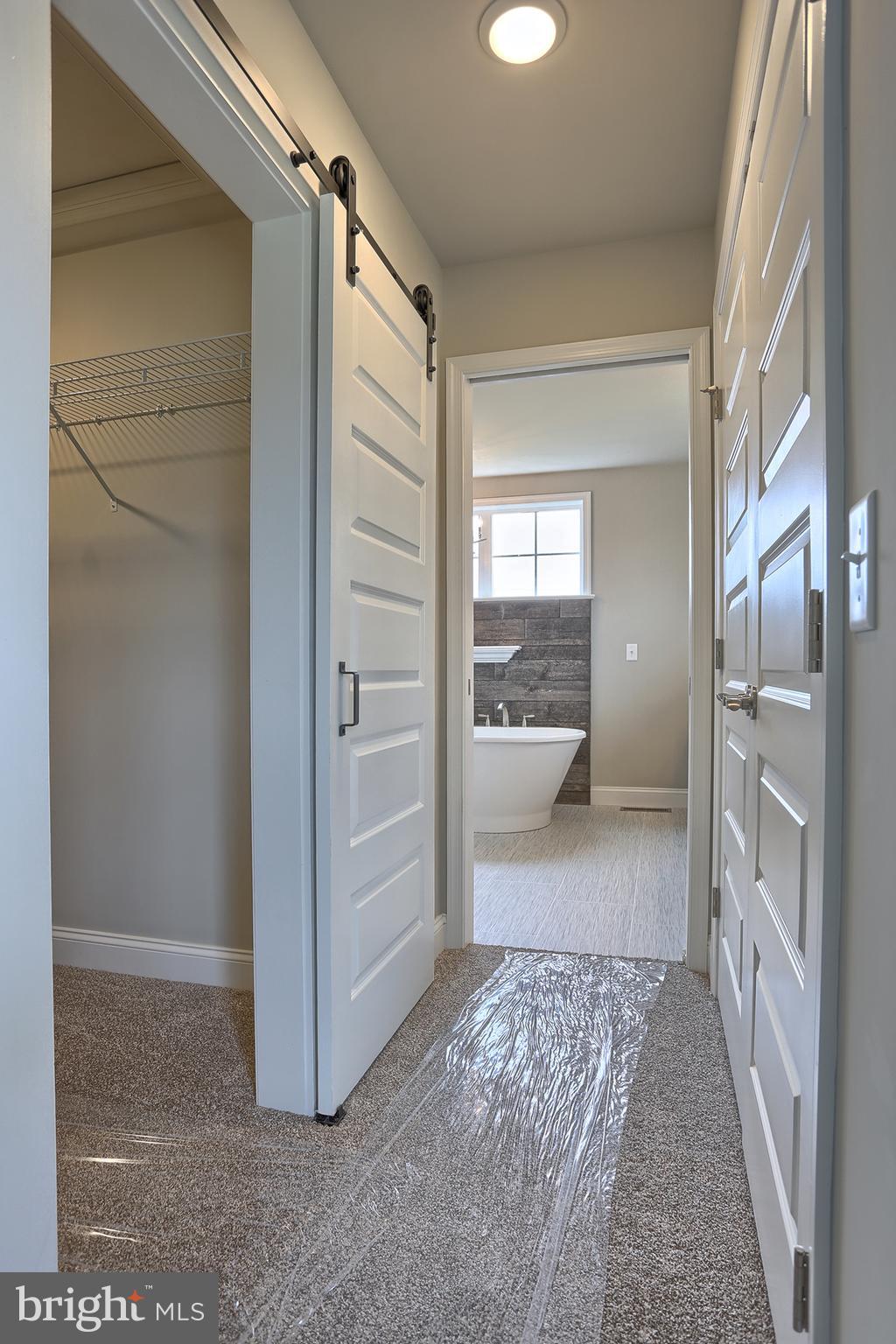 3 Rolling Meadow Road Lebanon, PA 17046 - Photo 28 of 34 a view of a hallway with bathroom and shower