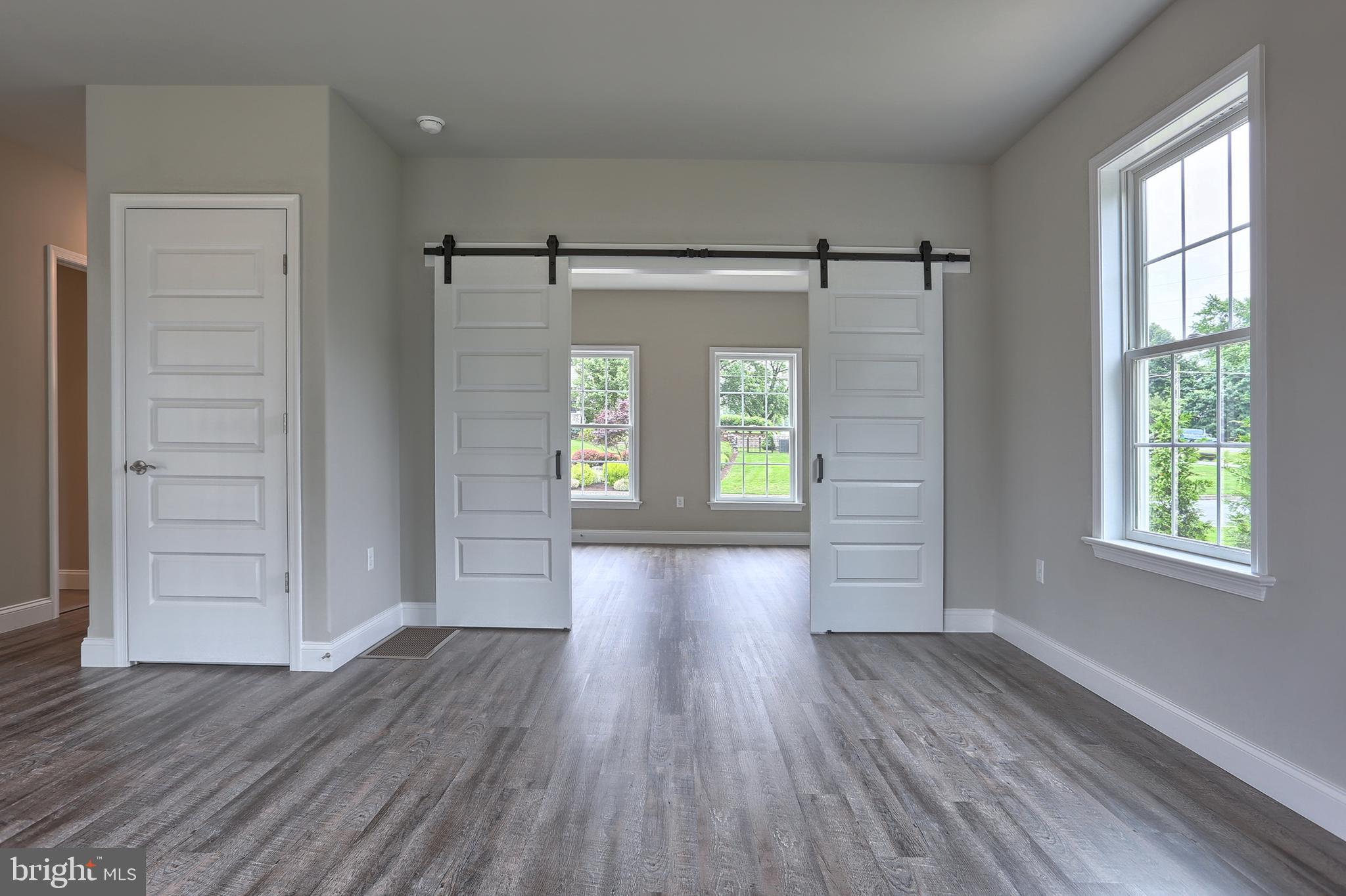 3 Rolling Meadow Road Lebanon, PA 17046 - Photo 33 of 34 wooden floor in an empty room with a window