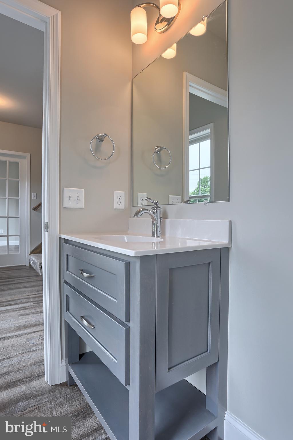 3 Rolling Meadow Road Lebanon, PA 17046 - Photo 4 of 34 a bathroom with a sink and a mirror