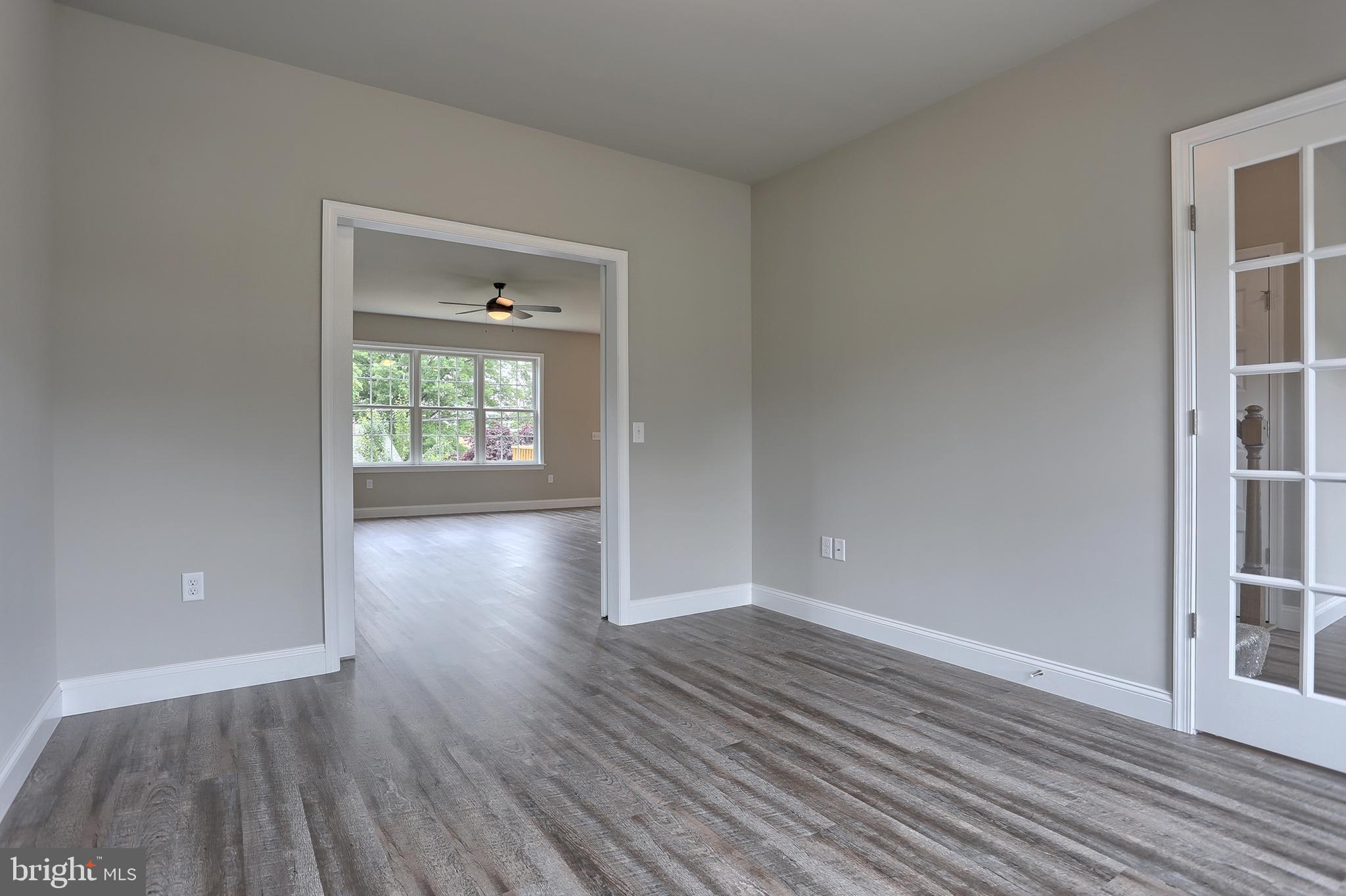 3 Rolling Meadow Road Lebanon, PA 17046 - Photo 7 of 34 wooden floor and windows in an empty room