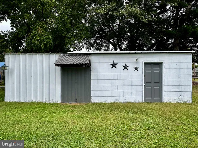 a wooden door in front of a house