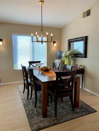 a view of a dining room with furniture