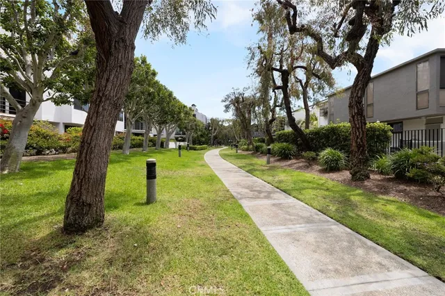 a view of a backyard with a small cabin